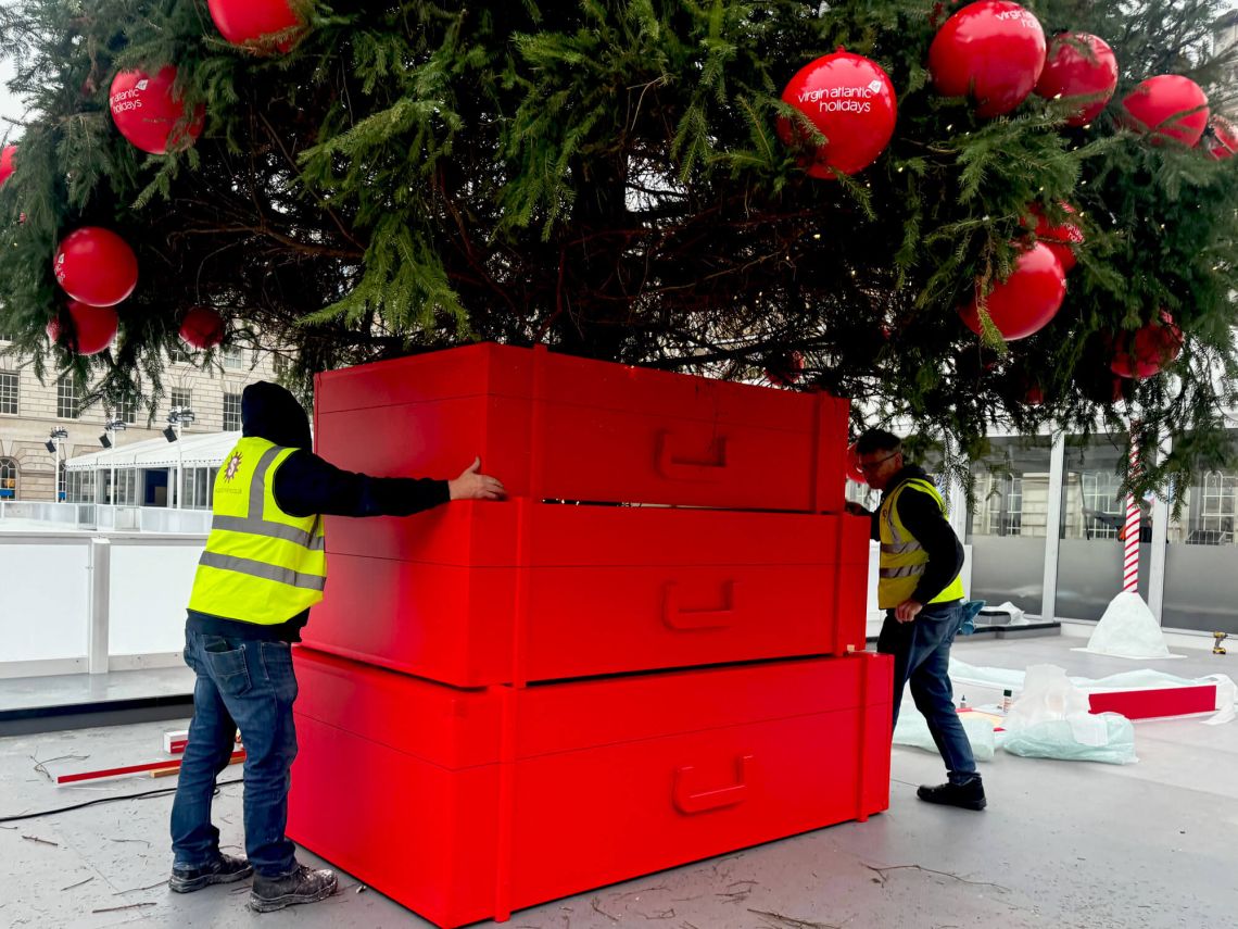 The suitcases for the tree base in position on site.